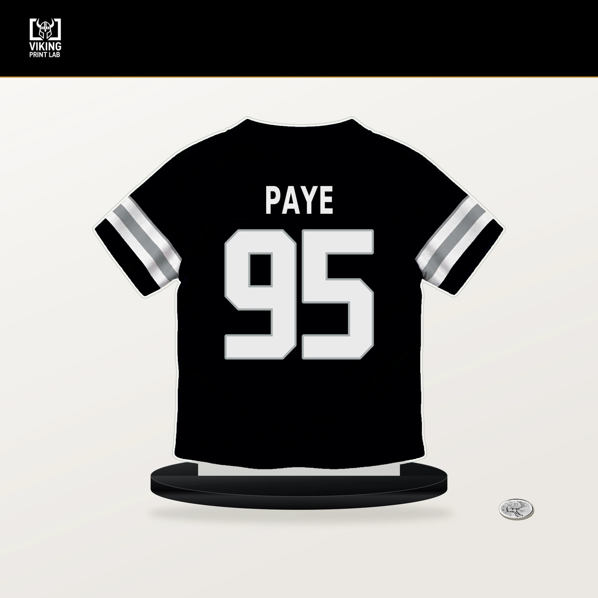 Kwity Paye number 95 Las Vegas Raiders jersey stand with included black base.