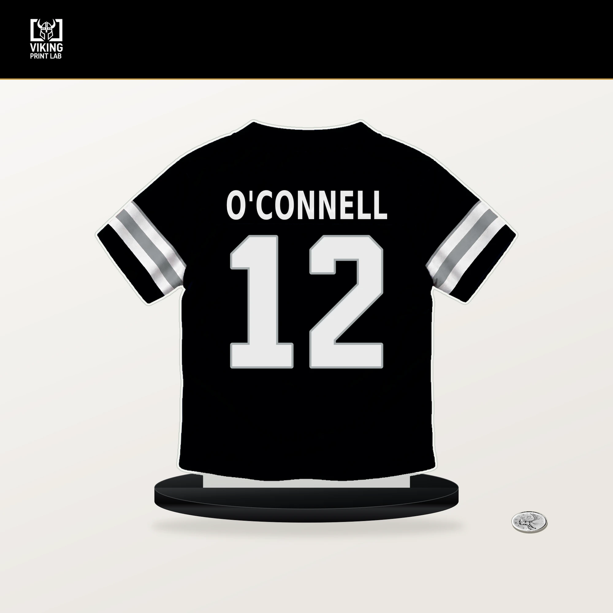 Aidan O'Connell number 12 Las Vegas Raiders jersey stand with included black base.