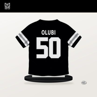 Segun Olubi number 50 Las Vegas Raiders jersey stand with included black base.
