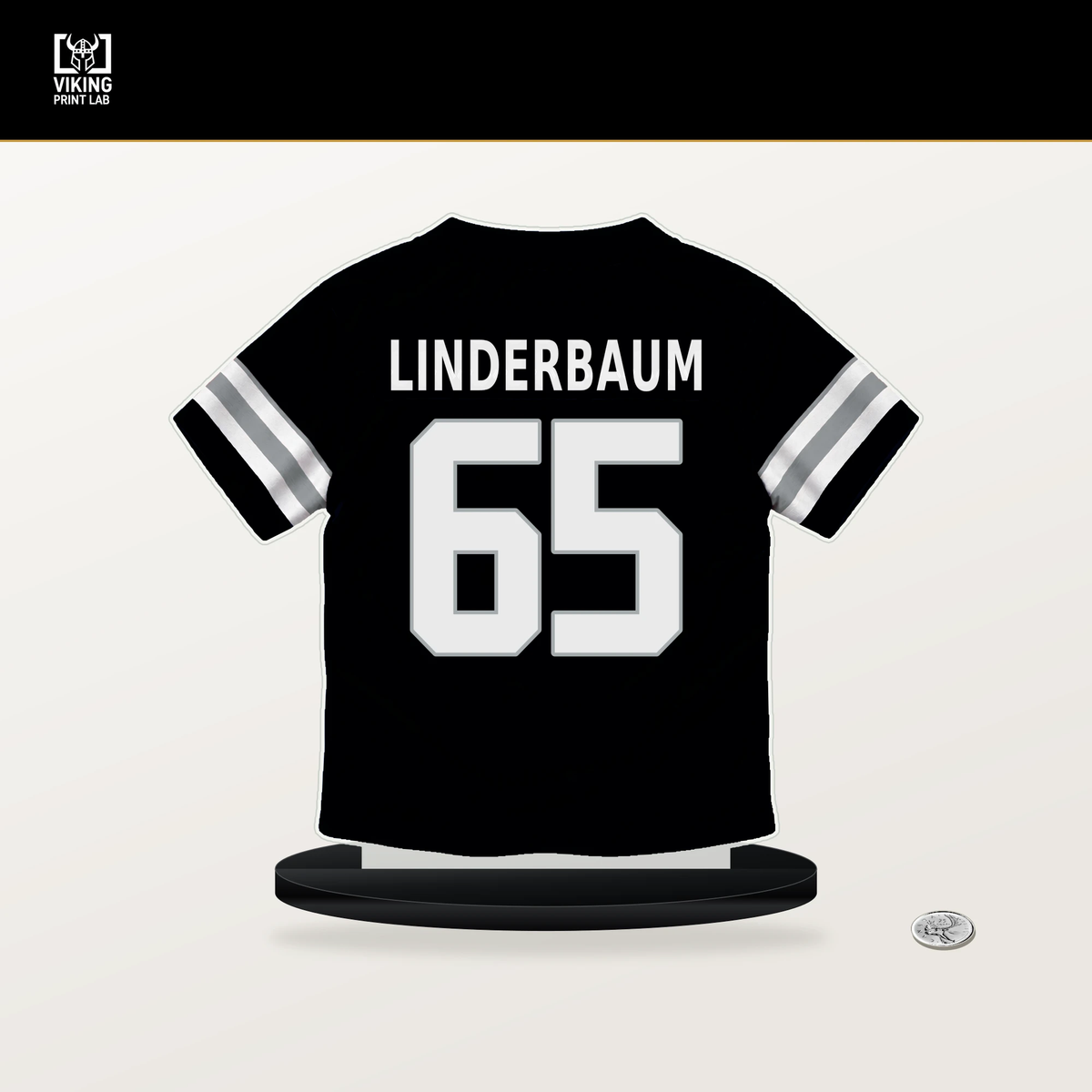 Tyler Linderbaum number 65 Las Vegas Raiders jersey stand with included black base.