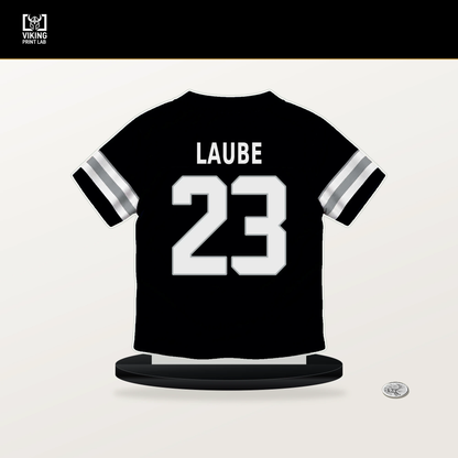 Dylan Laube number 23 Las Vegas Raiders jersey stand with included black base.