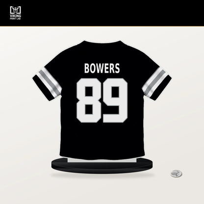 Brock Bowers number 89 Las Vegas Raiders jersey stand with included black base.