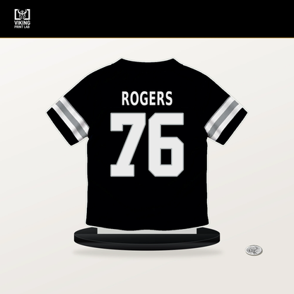 Caleb Rogers number 76 Las Vegas Raiders jersey stand with included black base.