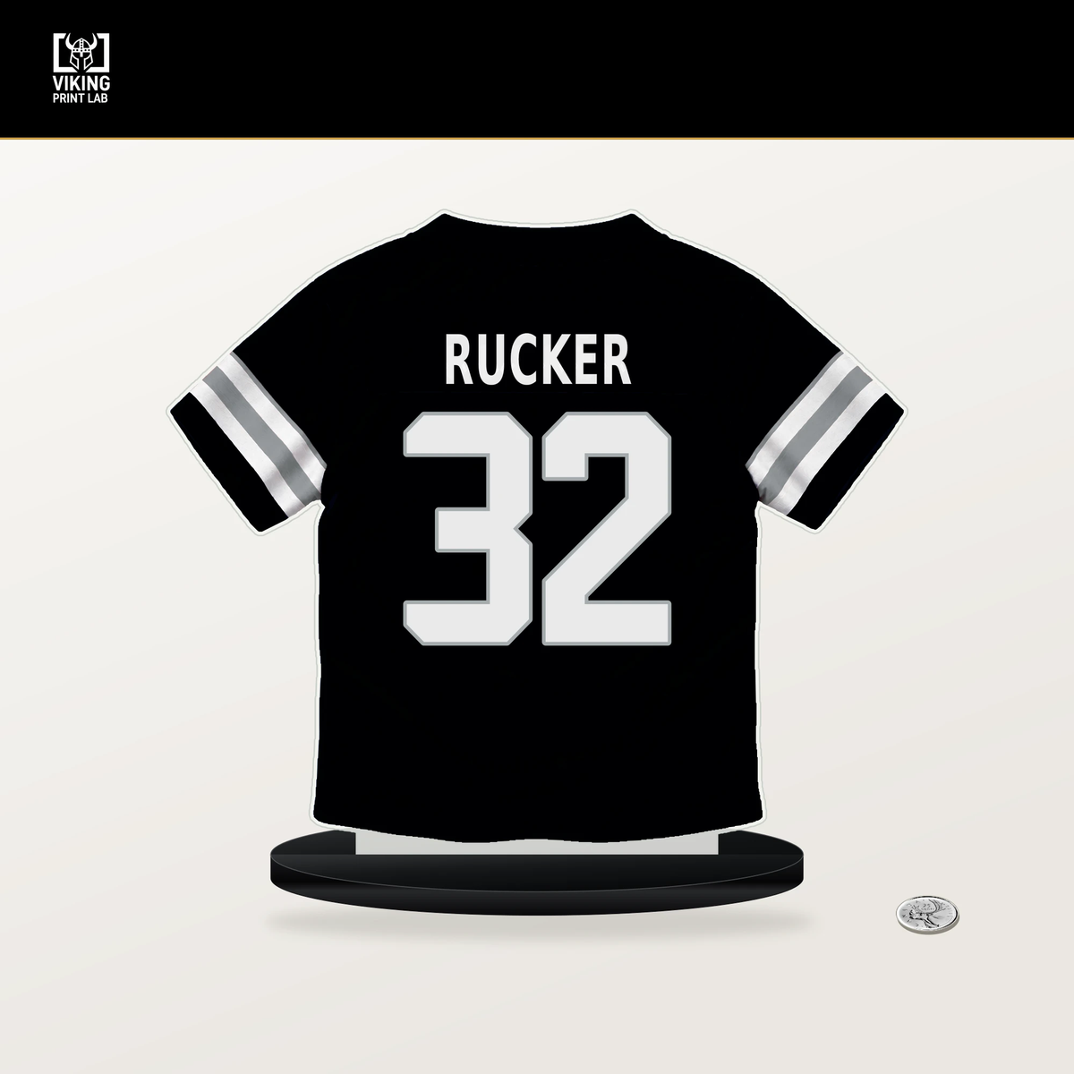 Corey Rucker number 32 Las Vegas Raiders jersey stand with included black base.