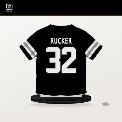 Corey Rucker number 32 Las Vegas Raiders jersey stand with included black base.