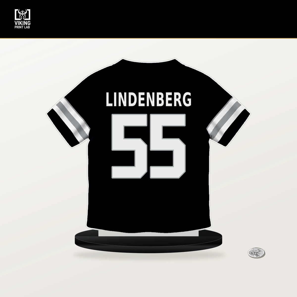Cody Lindenberg number 55 Las Vegas Raiders jersey stand with included black base.