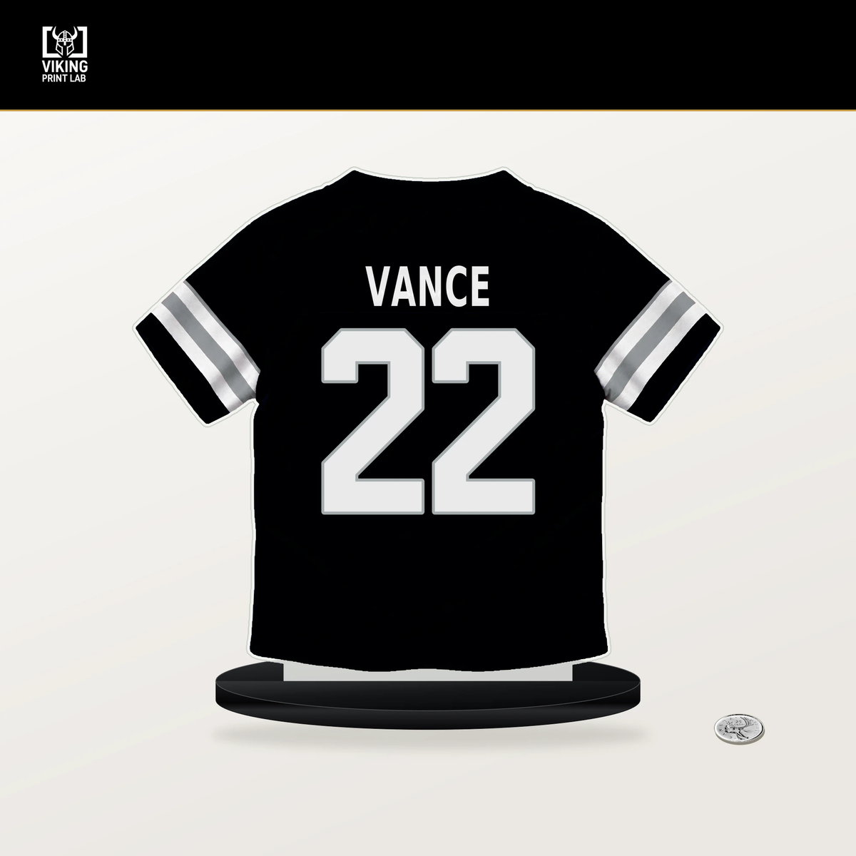Greedy Vance number 22 Las Vegas Raiders jersey stand with included black base.