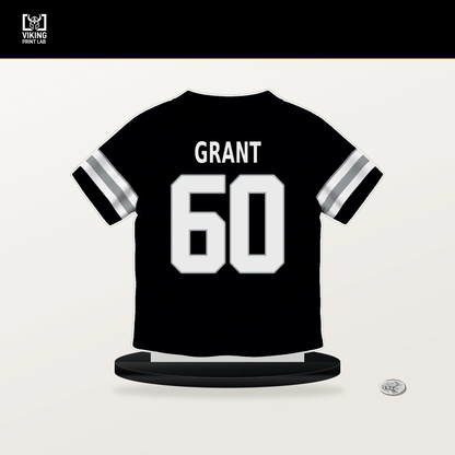 Charles Grant number 60 Las Vegas Raiders jersey stand with included black base.