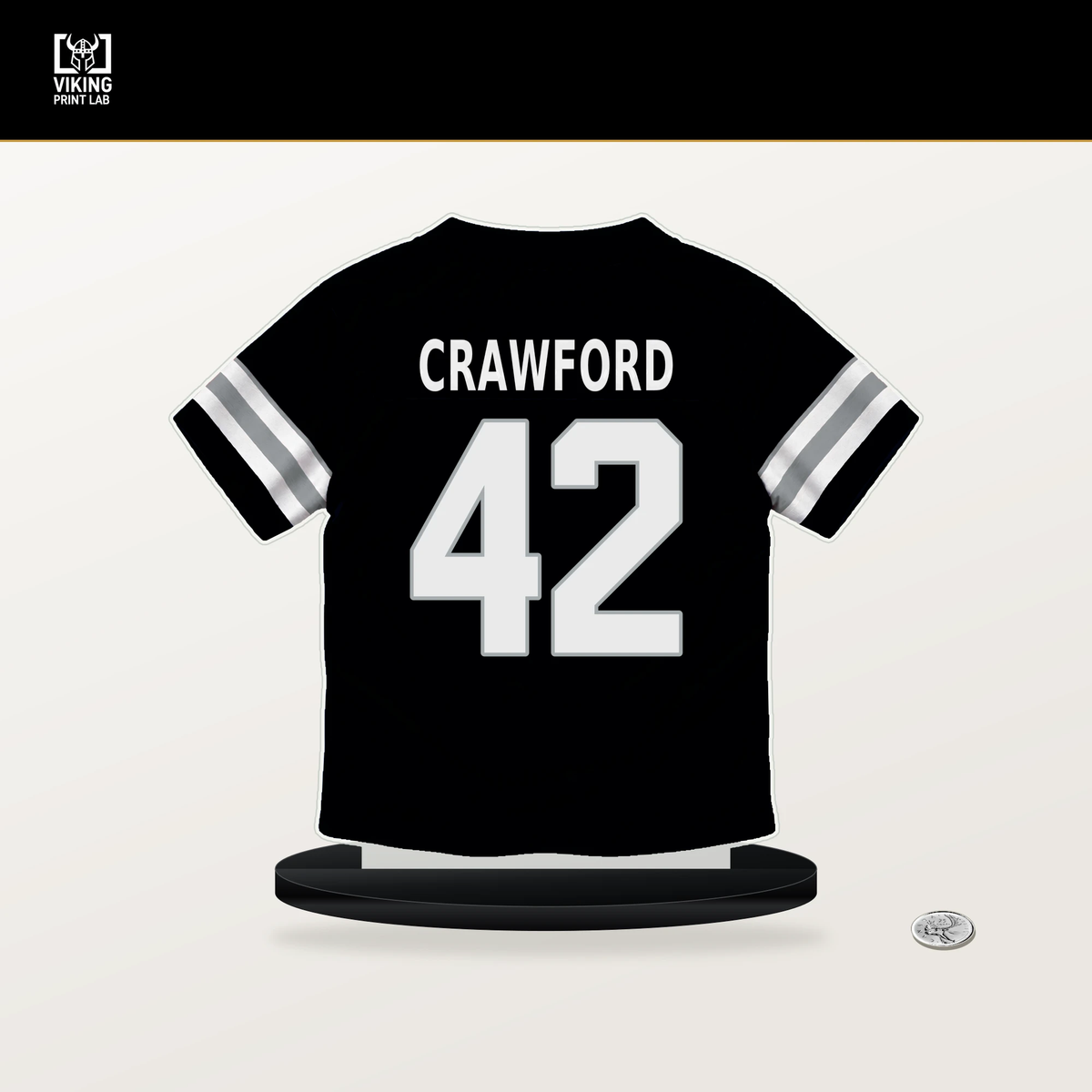 Keyron Crawford number 42 Las Vegas Raiders jersey stand with included black base.