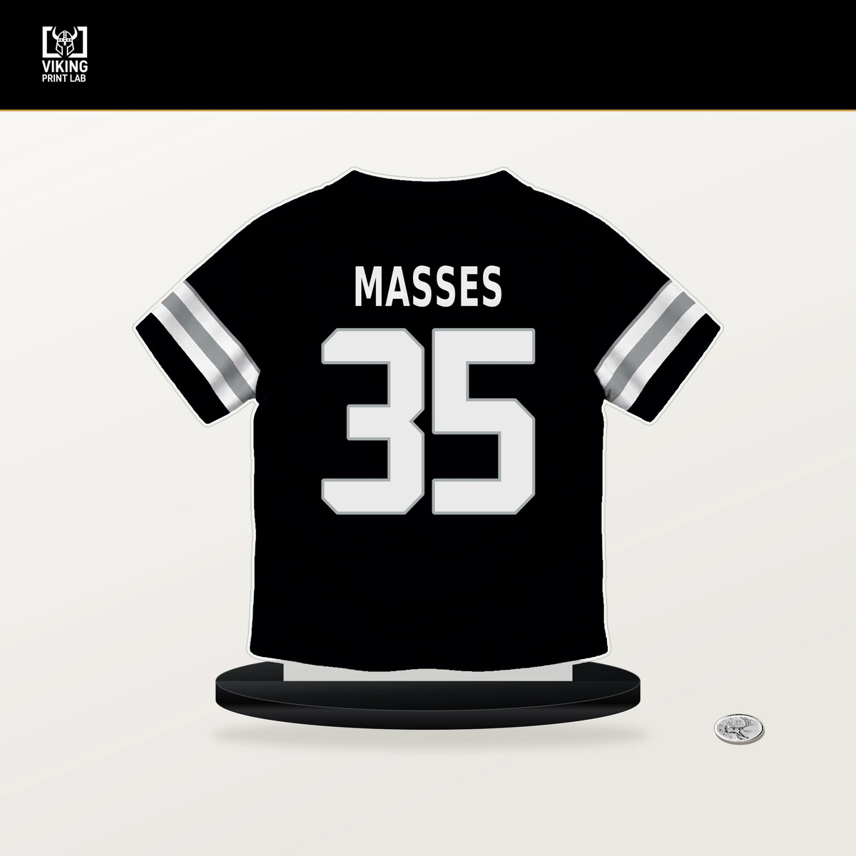 Hezekiah Masses number 35 Las Vegas Raiders jersey stand with included black base.