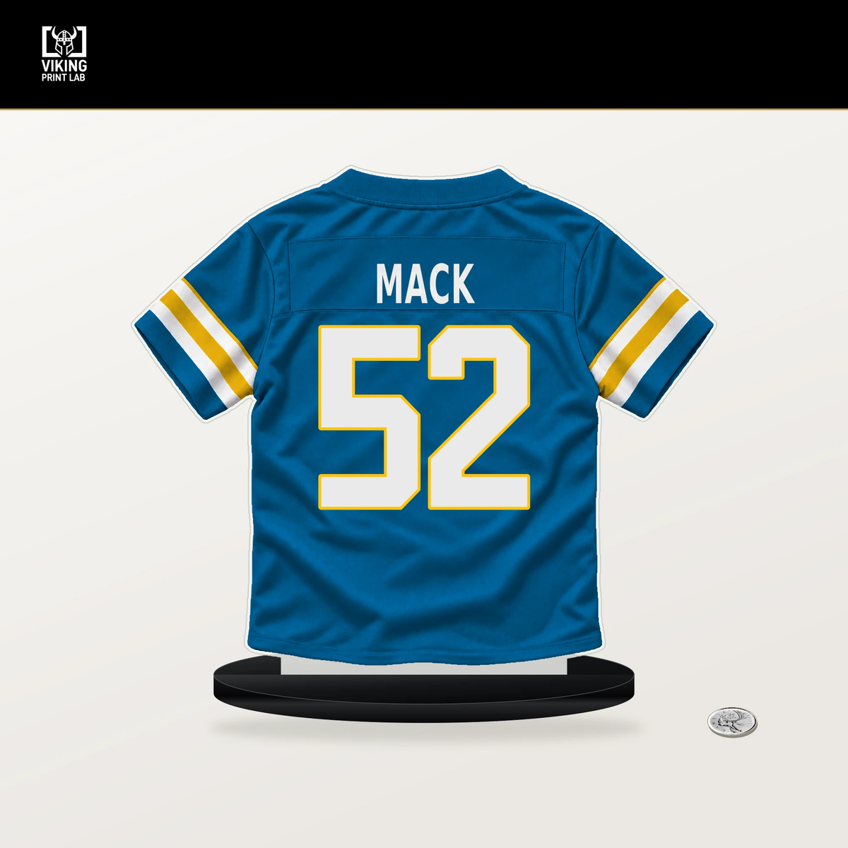 Khalil Mack number 52 Los Angeles Chargers jersey stand with included black base.
