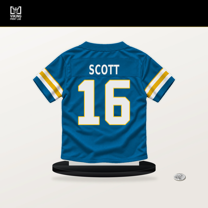 JK Scott number 16 Los Angeles Chargers jersey stand with included black base.