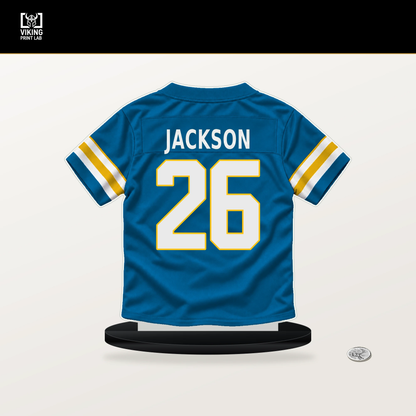 Donte Jackson number 26 Los Angeles Chargers jersey stand with included black base.