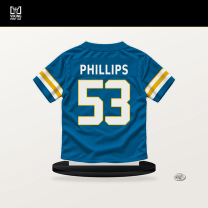 Del'Shawn Phillips number 53 Los Angeles Chargers jersey stand with included black base.