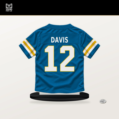 Derius Davis number 12 Los Angeles Chargers jersey stand with included black base.