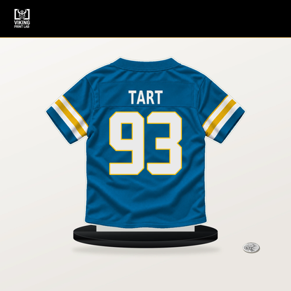 Teair Tart number 93 Los Angeles Chargers jersey stand with included black base.