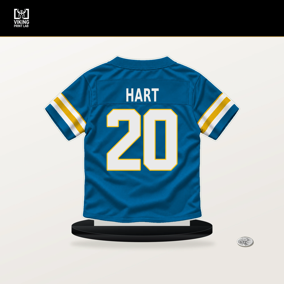 Cam Hart number 20 Los Angeles Chargers jersey stand with included black base.