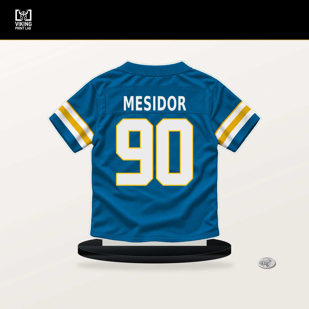 Akheem Mesidor number 90 Los Angeles Chargers jersey stand with included black base.