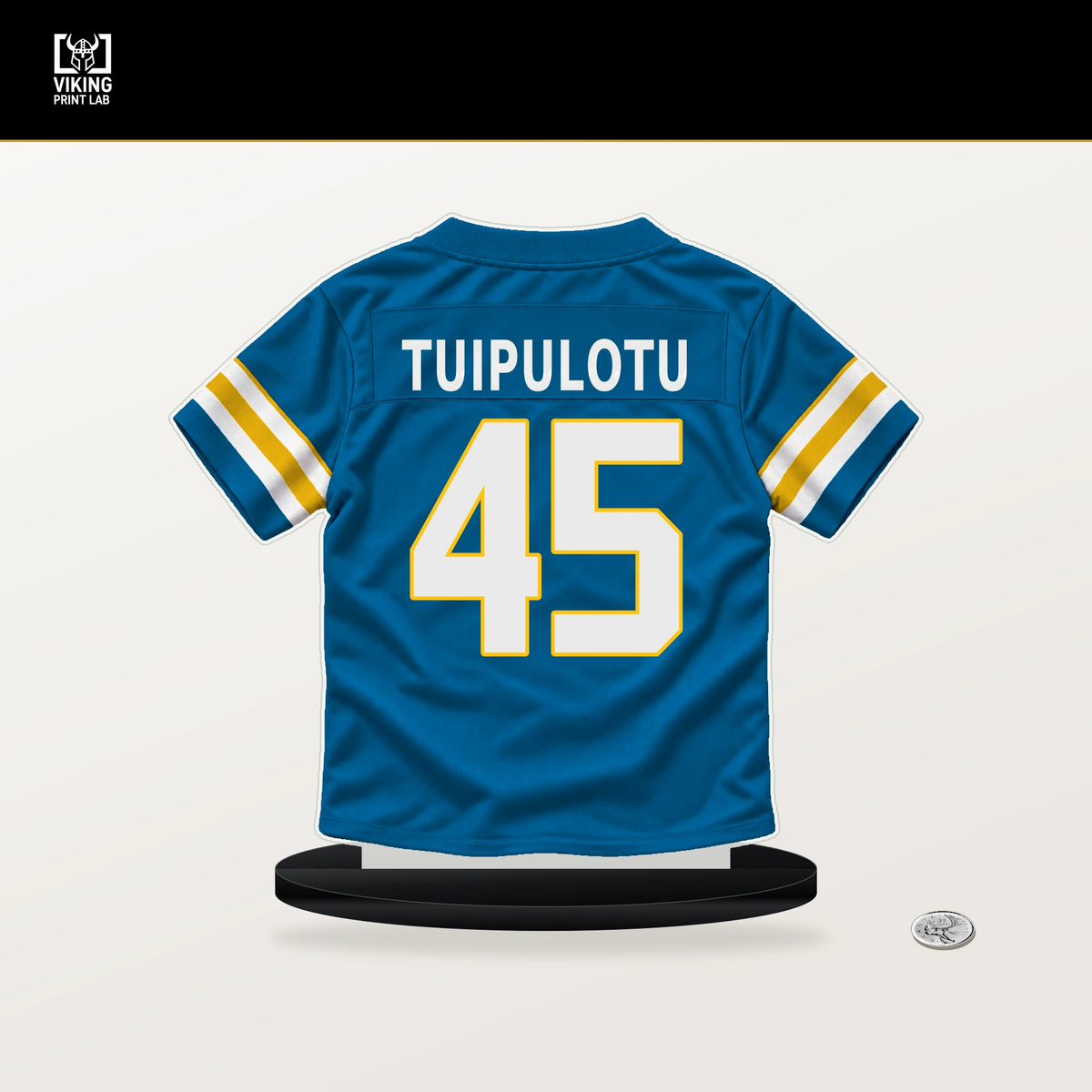 Tuli Tuipulotu number 45 Los Angeles Chargers jersey stand with included black base.