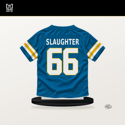 Jake Slaughter number 66 Los Angeles Chargers jersey stand with included black base.