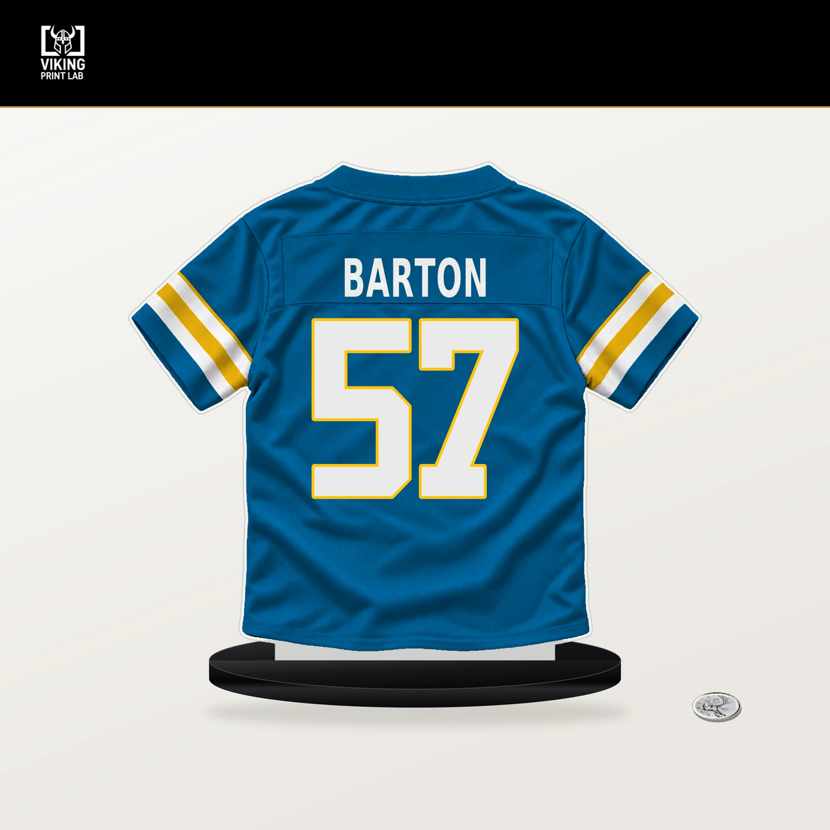 Lander Barton number 57 Los Angeles Chargers jersey stand with included black base.