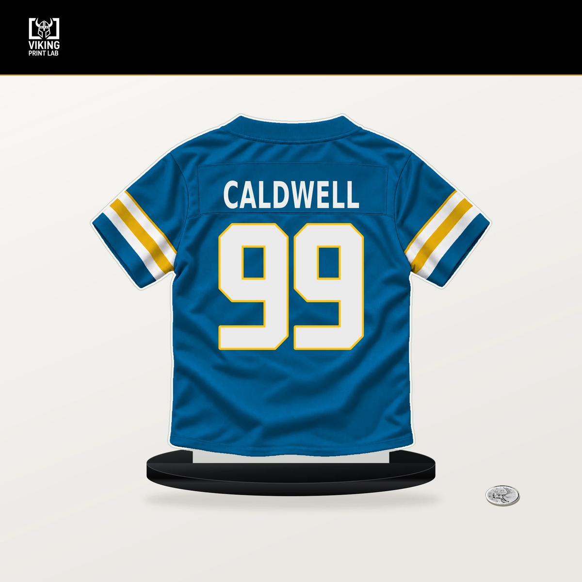 Jamaree Caldwell number 99 Los Angeles Chargers jersey stand with included black base.
