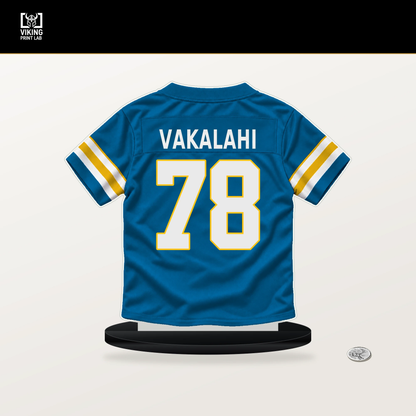 Laekin Vakalahi number 78 Los Angeles Chargers jersey stand with included black base.