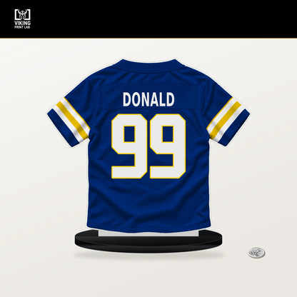 Aaron Donald number 99 Los Angeles Rams jersey stand with included black base.