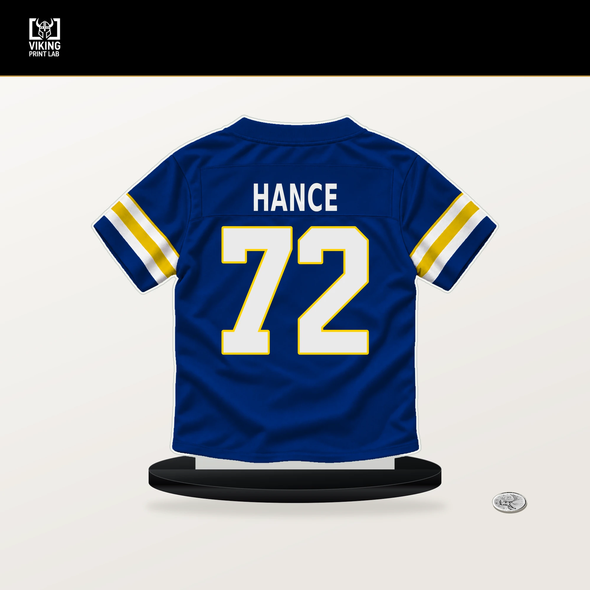 Blake Hance number 72 Los Angeles Rams jersey stand with included black base.