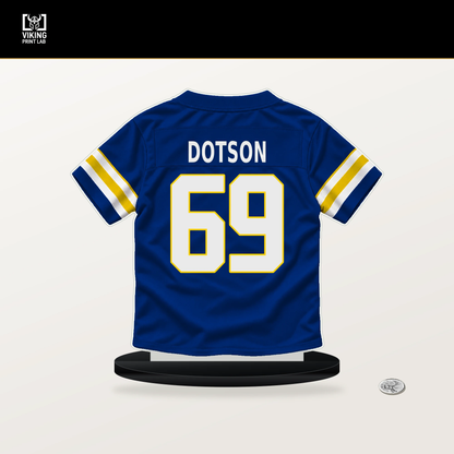 Kevin Dotson number 69 Los Angeles Rams jersey stand with included black base.