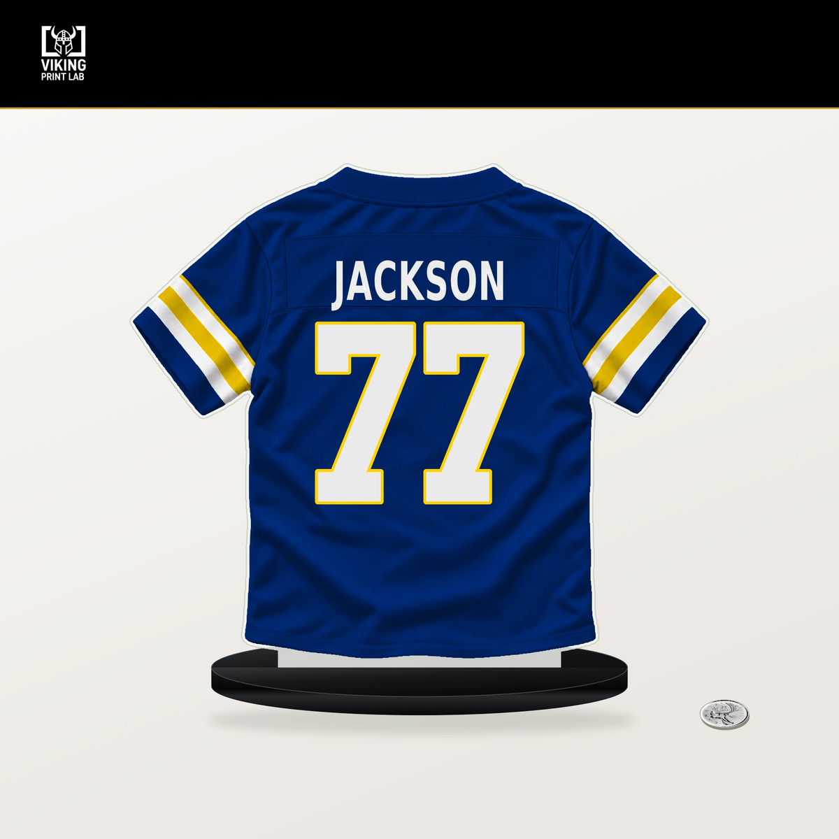 Alaric Jackson number 77 Los Angeles Rams jersey stand with included black base.