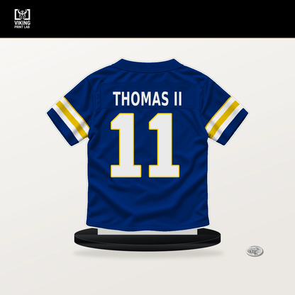 Keir Thomas II number 11 Los Angeles Rams jersey stand with included black base.