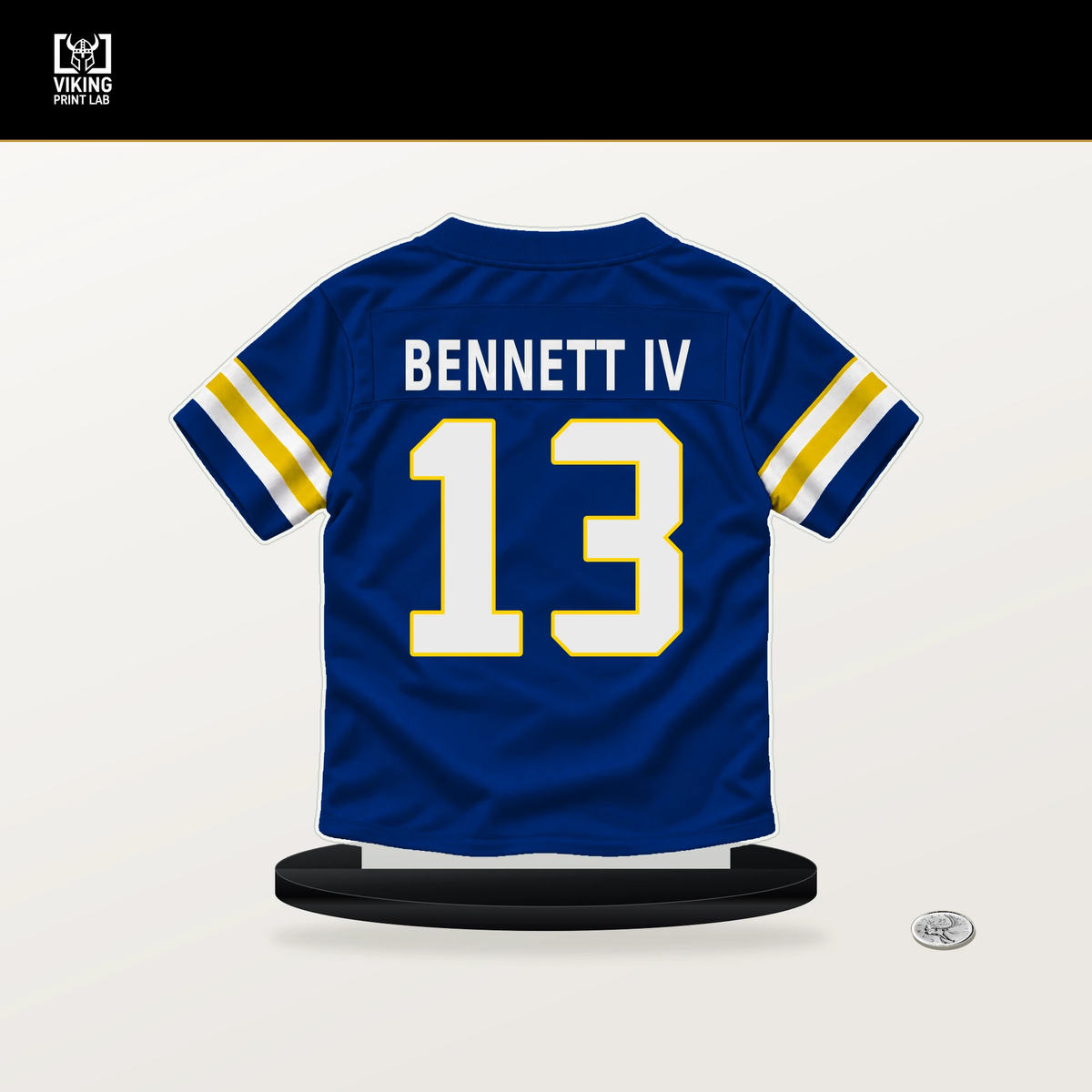 Stetson Bennett IV number 13 Los Angeles Rams jersey stand with included black base.