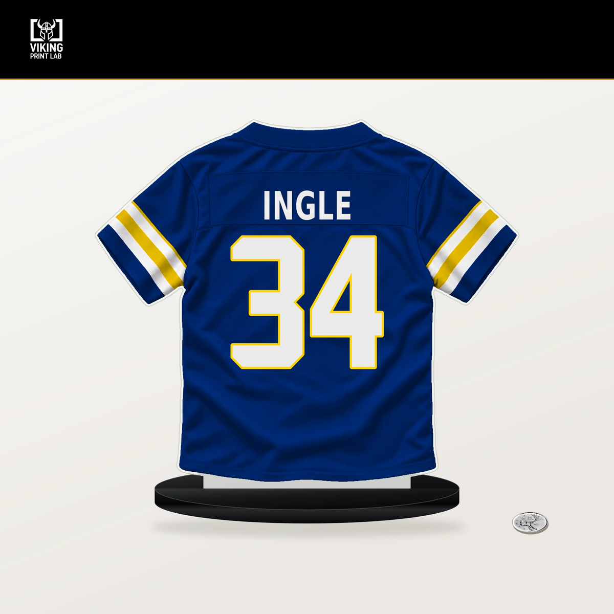 Tanner Ingle number 34 Los Angeles Rams jersey stand with included black base.