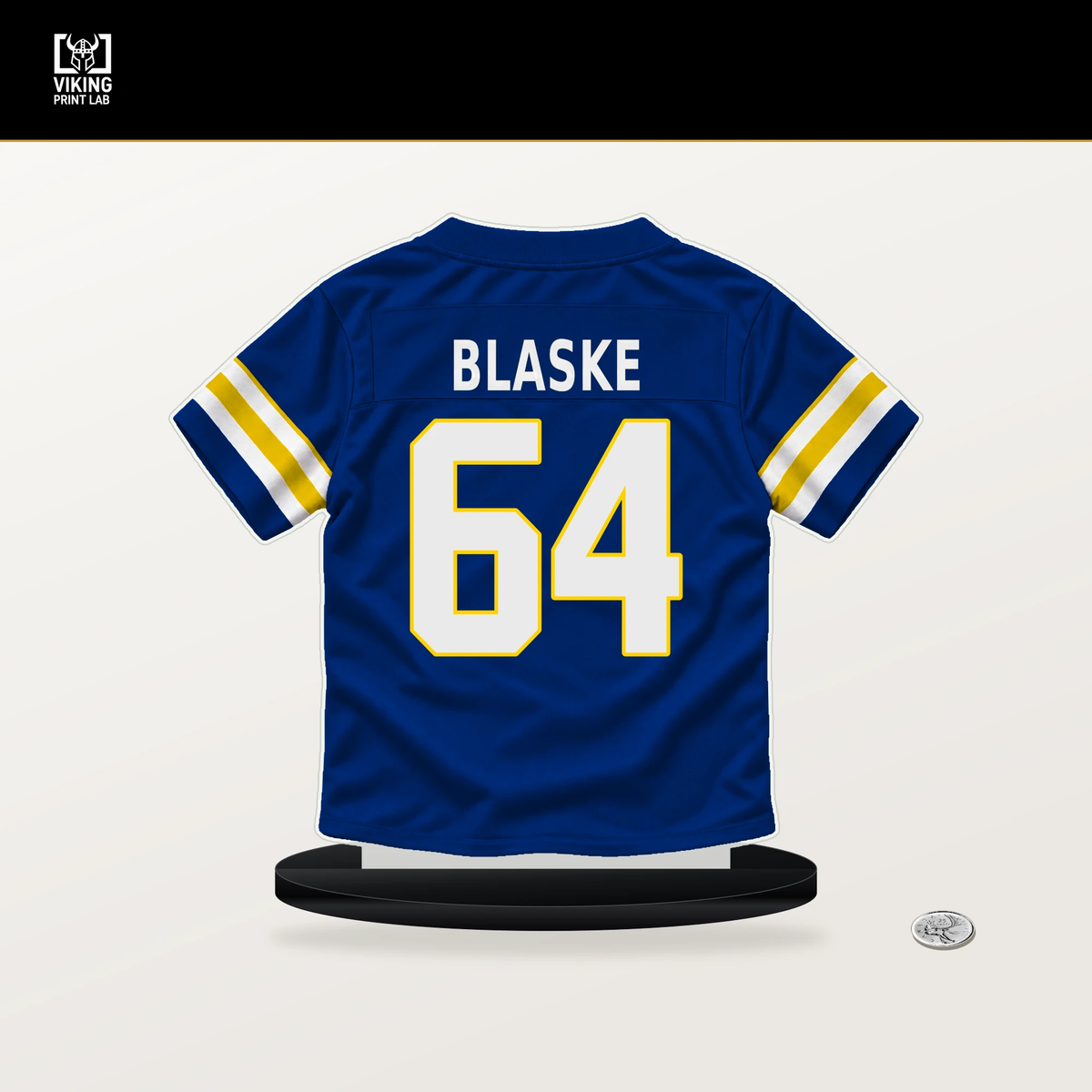 Austin Blaske number 64 Los Angeles Rams jersey stand with included black base.