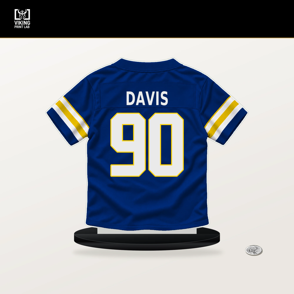 Tyler Davis number 90 Los Angeles Rams jersey stand with included black base.
