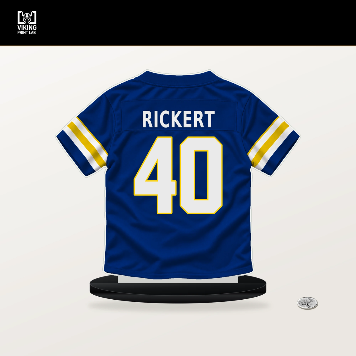 Daniel Rickert number 40 Los Angeles Rams jersey stand with included black base.