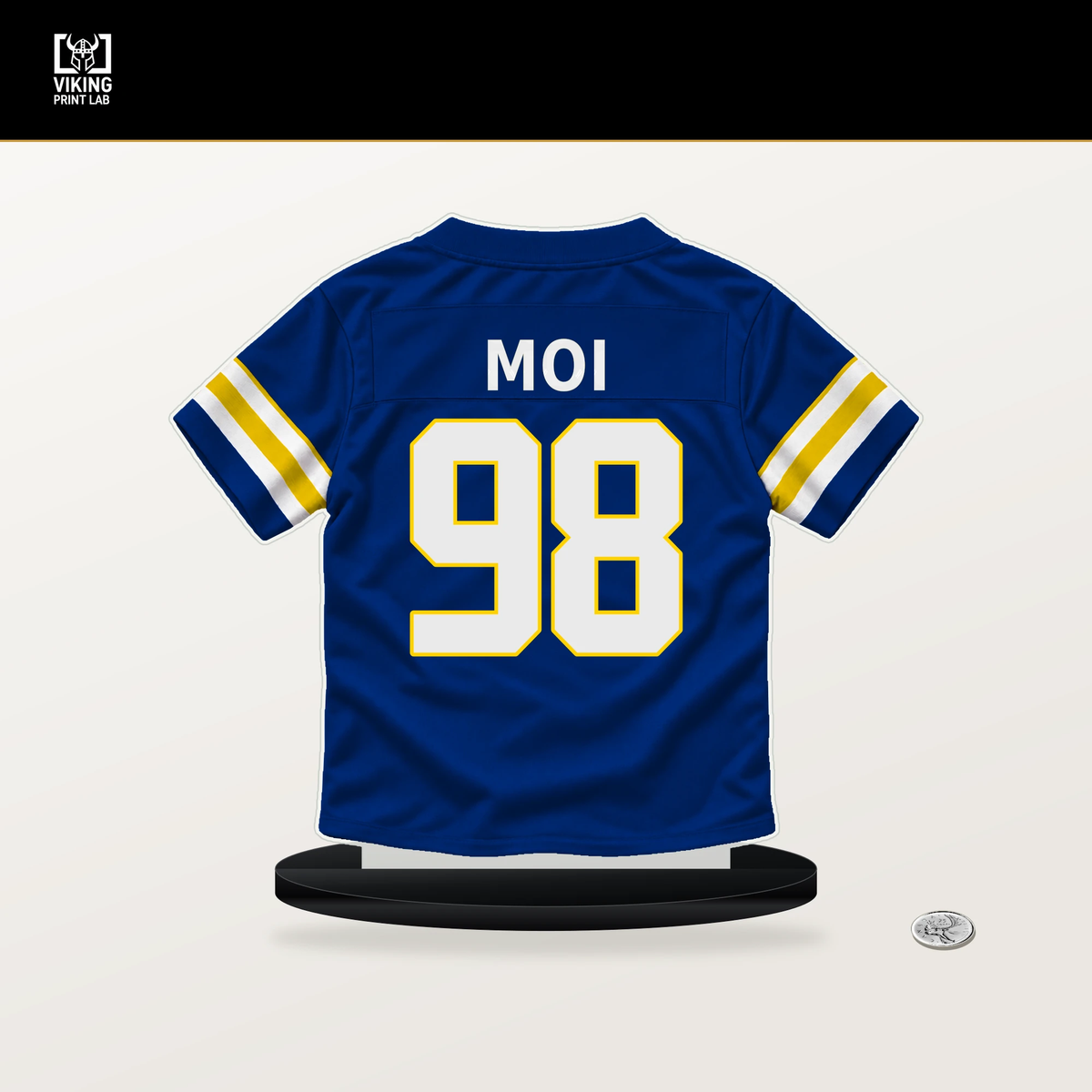 Jaxson Moi number 98 Los Angeles Rams jersey stand with included black base.