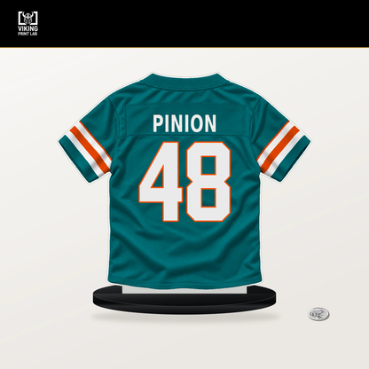 Bradley Pinion number 48 Miami Dolphins jersey stand with included black base.
