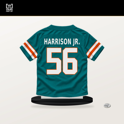 Ronnie Harrison Jr. number 56 Miami Dolphins jersey stand with included black base.