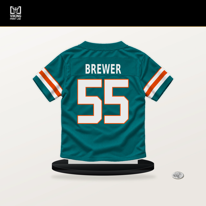 Aaron Brewer number 55 Miami Dolphins jersey stand with included black base.
