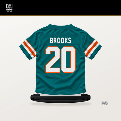 Jordyn Brooks number 20 Miami Dolphins jersey stand with included black base.