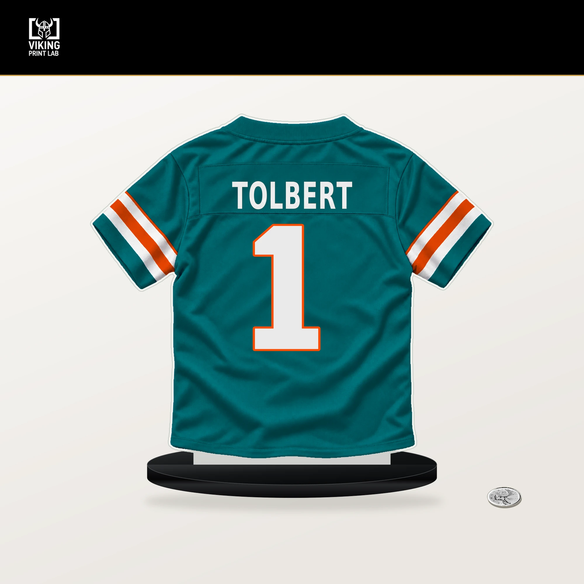 Jalen Tolbert number 1 Miami Dolphins jersey stand with included black base.