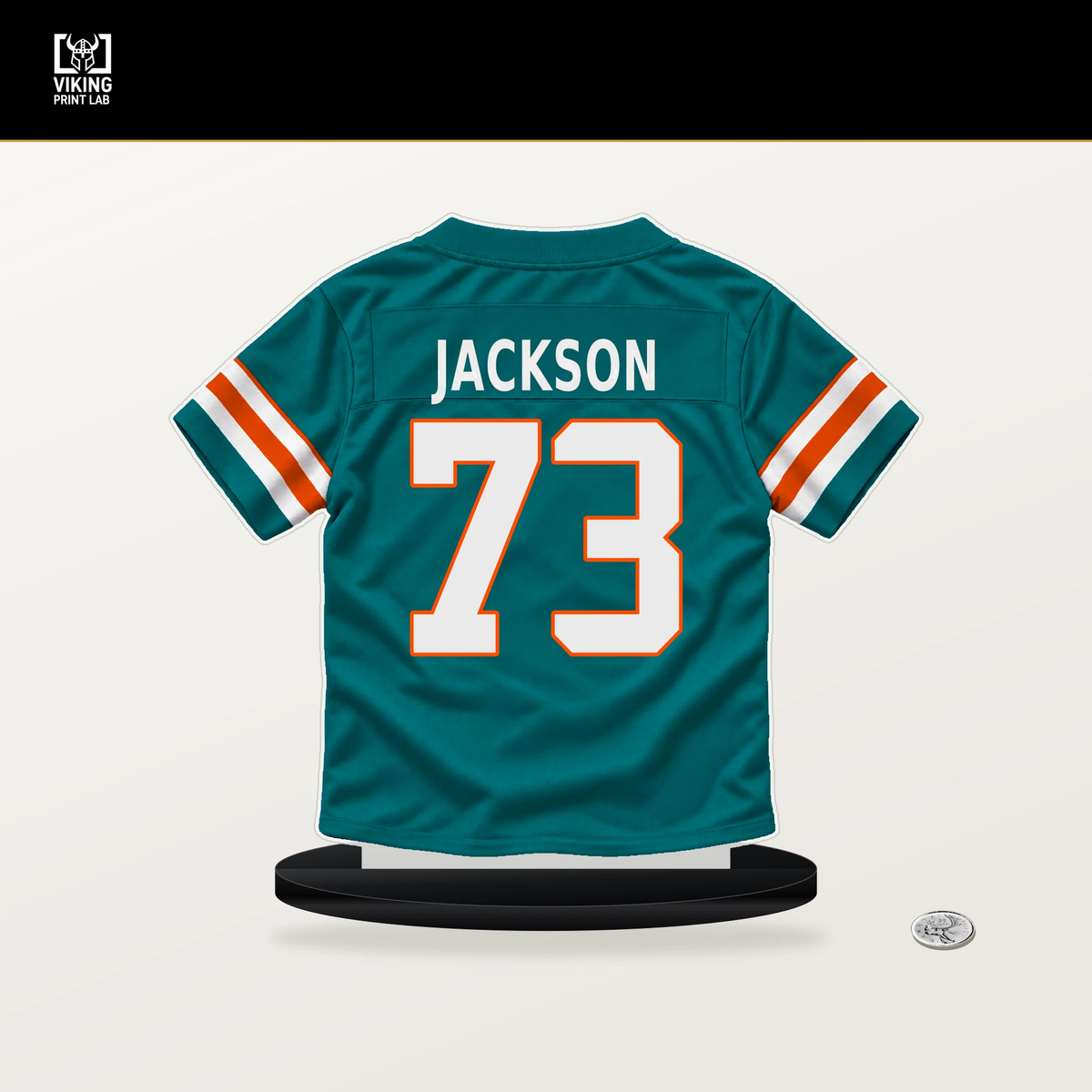 Austin Jackson number 73 Miami Dolphins jersey stand with included black base.