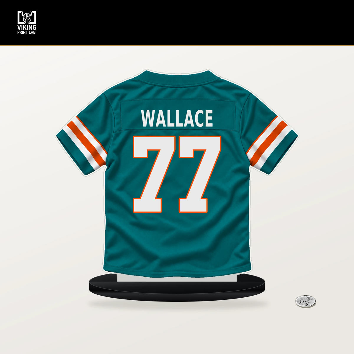 Caedan Wallace number 77 Miami Dolphins jersey stand with included black base.