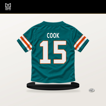 Brady Cook number 15 Miami Dolphins jersey stand with included black base.