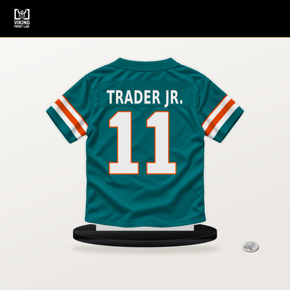 Dante Trader Jr. number 11 Miami Dolphins jersey stand with included black base.