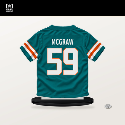 Rodney McGraw number 59 Miami Dolphins jersey stand with included black base.
