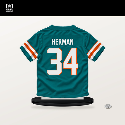 DJ Herman number 34 Miami Dolphins jersey stand with included black base.