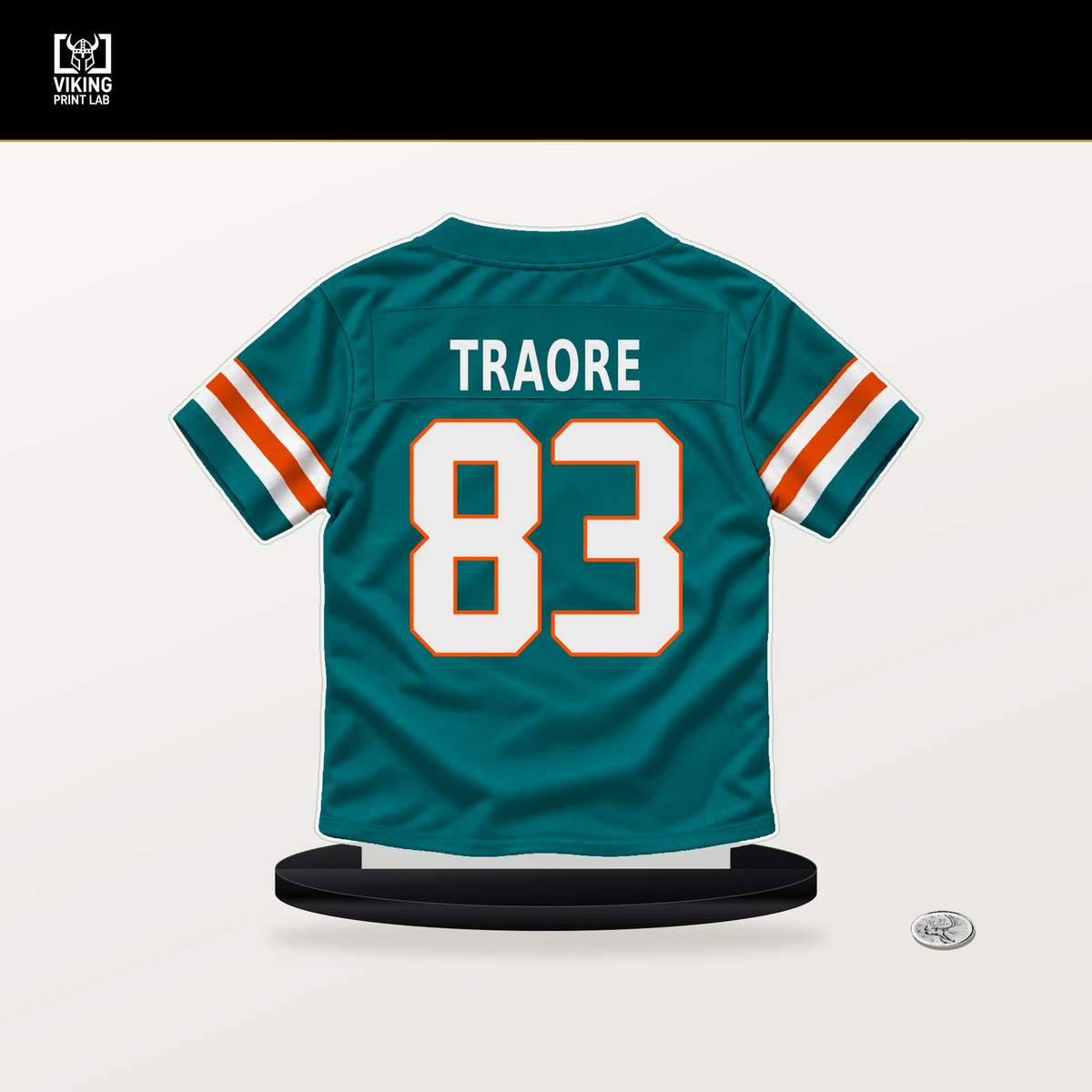 Seydou Traore number 83 Miami Dolphins jersey stand with included black base.